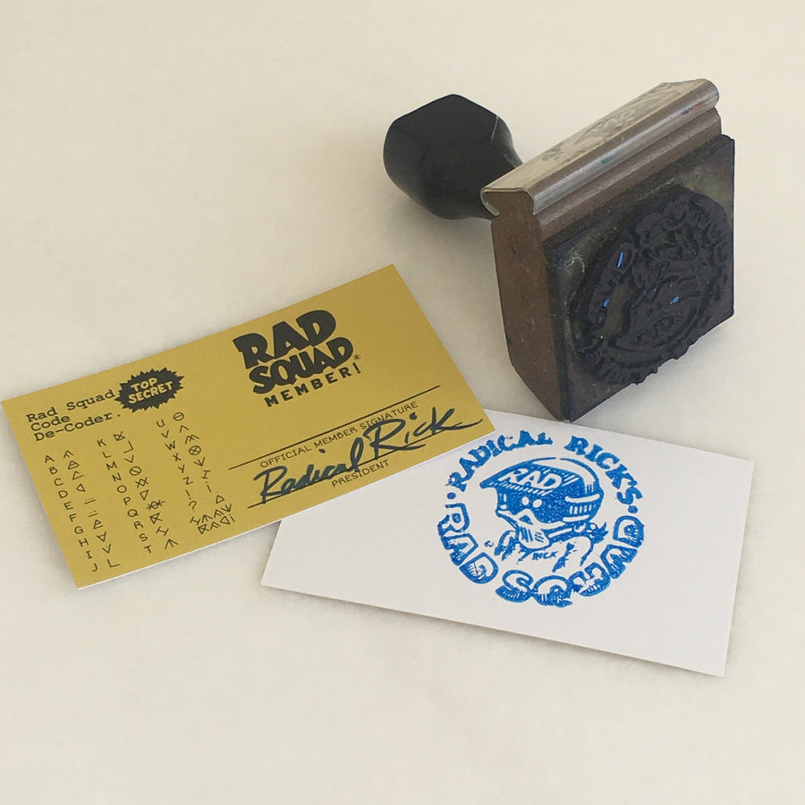 Actual stamp not included, DANG! But a Rad Squad card comes with the artwork signed by RADICAL RICK himself!